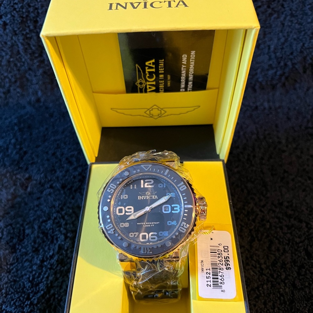 Invicta- 14k gold plated and black, Pro Divers 3 hand dial Watch.